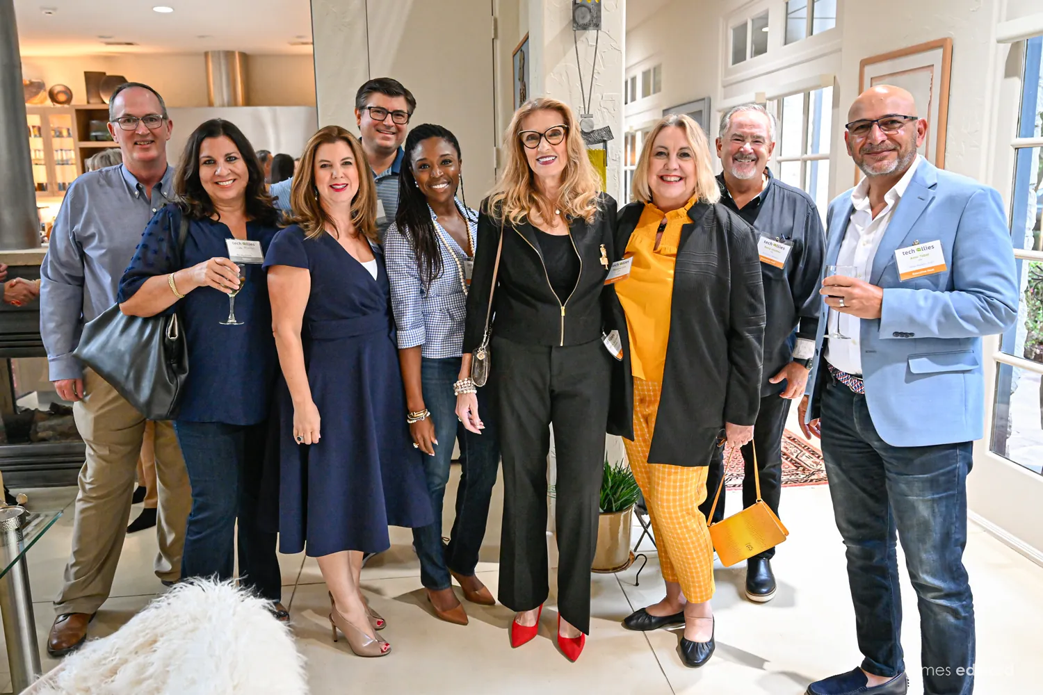 Technology executives and sponsors networking at a Tech Allies reception